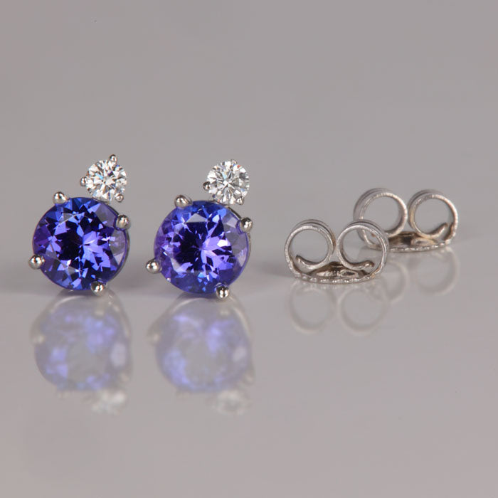 blue violet tanzanite gemstone earrings with diamonds white gold