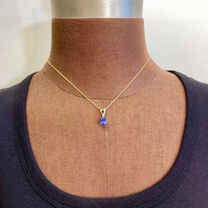 yellow gold tanzanite pendant oval cut gemstone