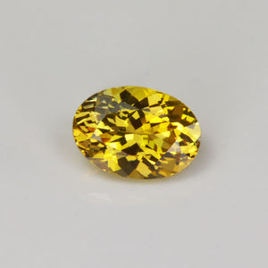 fancy tanzanite yellow golden oval cut gemstone