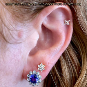 round tanzanite studs with halo size to ear