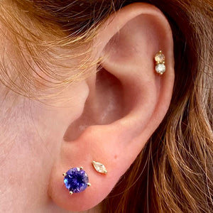round cut tanzanite studs yellow gold