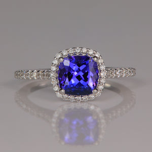blue violet tanzanite gemstone ring with diamonds in white gold