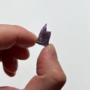 tanzanite crystal in hand