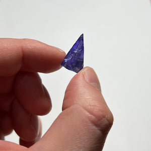 crystal tanzanite in hand