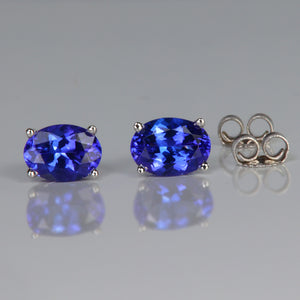 tanzanite stud earrings in white gold oval cut