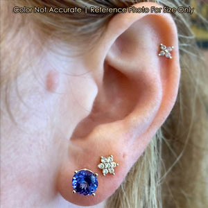 yellow gold round tanzanite studs