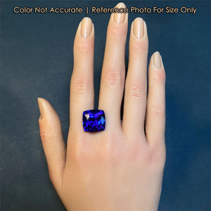 large beautiful tanzanite gemstone on hand