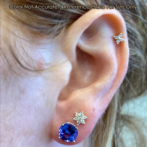 round brilliant tanzanite studs in white gold