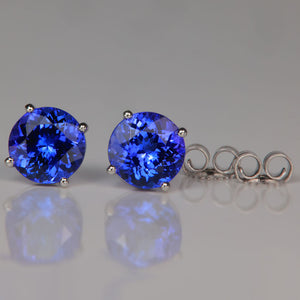 mostly blue round brilliant cut tanzanite gemstone martini style earrings
