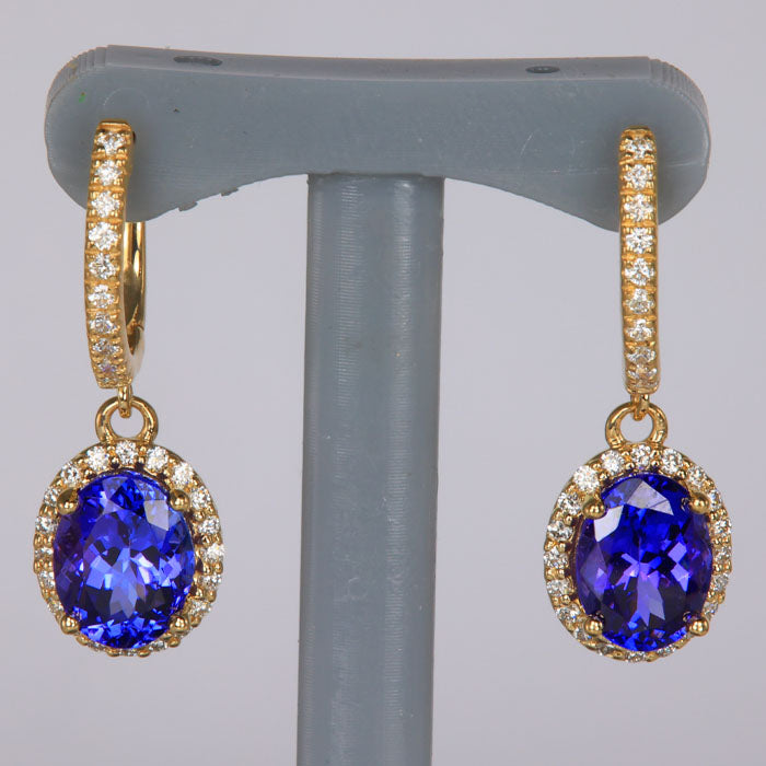 oval cut tanzanite gemstone earrings diamonds yellow gold huggie pierced