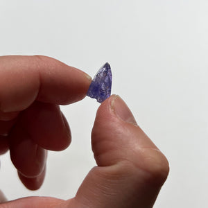 tanzanite crystal specimen in hand