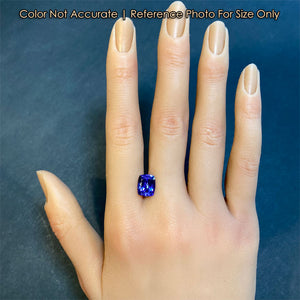 tanzanite gemstone on hand size
