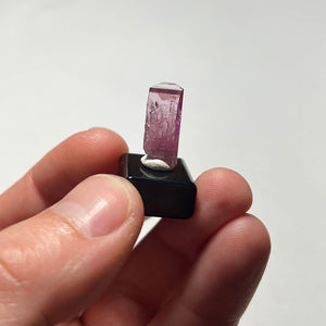 tanzanite pink crystal in hand