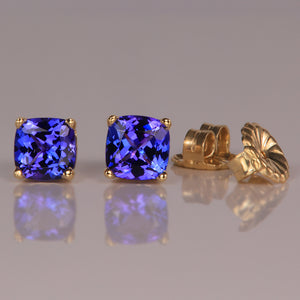 square cushion violet blue tanzanite stud earrings in yellow gold