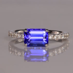 blue violet tanzanite gemstone ring in white gold with diamonds