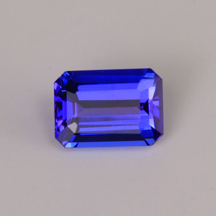 emerald cut tanzanite blue violet gem