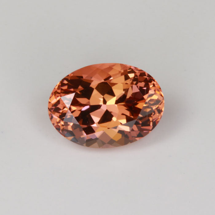 oval pink orange fancy tanzanite gemstone