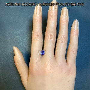 tanzanite gemstone heart shaped on hand