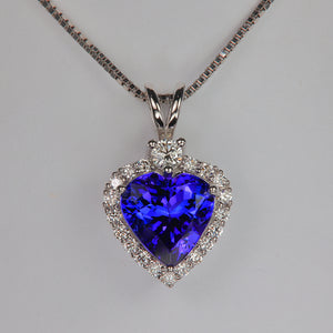 blue violet heart tanzanite gemstone pendant with diamonds in white gold