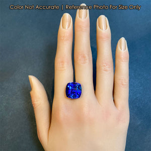 violet blue tanzanite gemstone size to hand