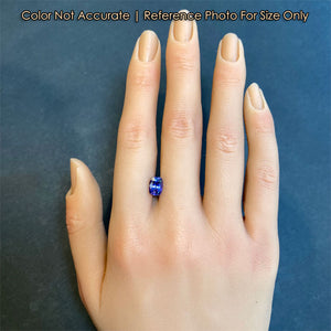 antique cushion tanzanite mostly blue gemstone size to hand