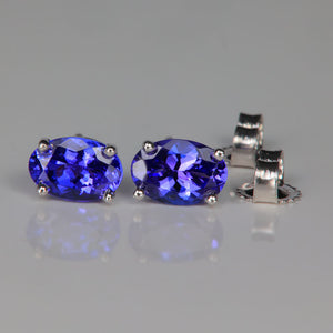 white gold and oval cut tanzanite gemstone earrings