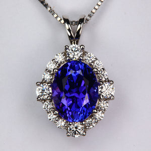 oval cut blue violet tanzanite gemstone pendant with diamonds