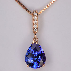 pear shaped tanzanite gemstone in 14k rose gold with diamond accents