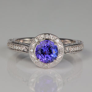 detailed tanzanite and diamond ring in white gold
