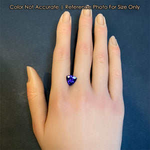 trilliant tanzanite size on hand