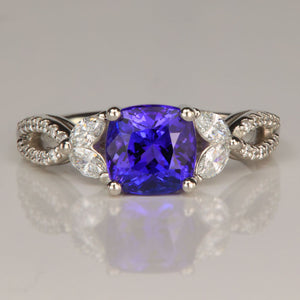blue violet square cushion tanzanite and diamond ring in platinum