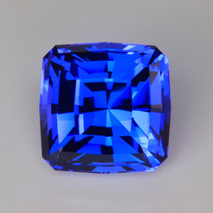 mostly blue square cushion cut tanzanite gem