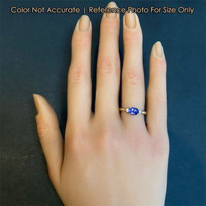 14K Yellow Gold Oval Tanzanite And Diamond Ring