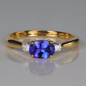 oval tanzanite ring with diamond accents