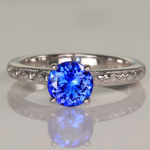 round tanzanite ring white gold