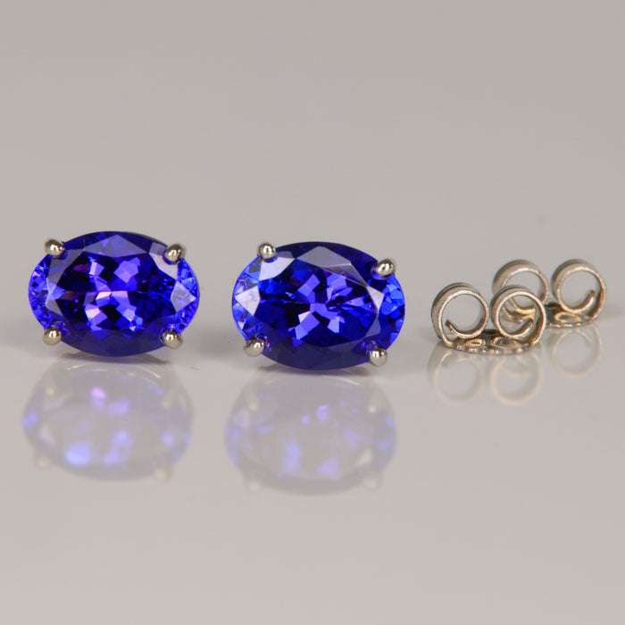 oval tanzanite blue violet gemstone stud earrings white gold