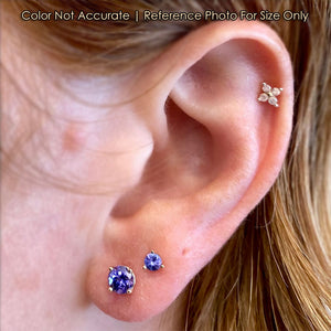 yellow gold tanzanite stud size