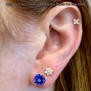 yellow gold tanzanite gem earrings 2.66cts on ear