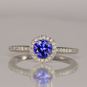 white gold tanzanite ring with diamonds