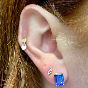 blue violet emerald cut tanzanite studs