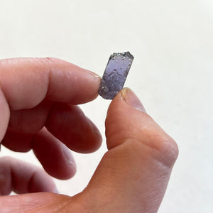 Natural purple tanzanite crystal specimen