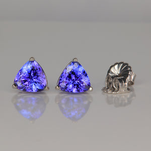 white gold stud earrings with trilliant cut tanzanite gemstone