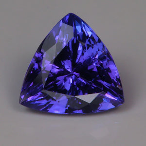 blue violet tanzanite gemstone trilliant cut