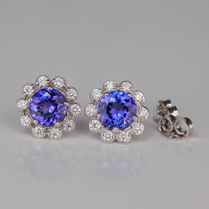 round brilliant tanzanite gem stud earrings with diamonds