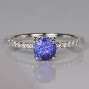 round brilliant tanzanite and diamond ring in white gold