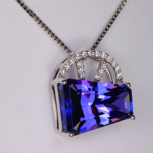 keystone cut tanzanite and diamond pendant angle