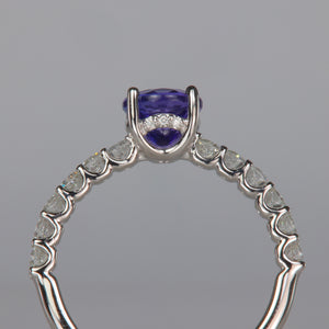 hidden halo of diamonds in tanzanite ring