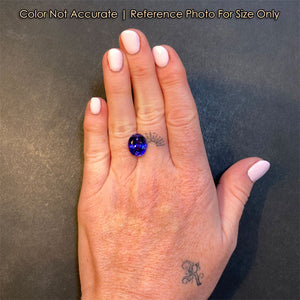 oval cut tanzanite gemstone size to a hand