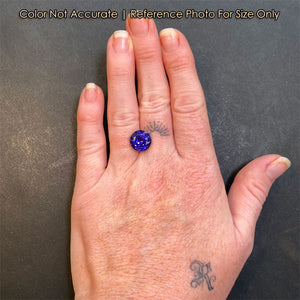 round cut tanzanite size to hand reference