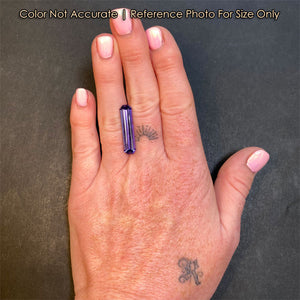 tanzanite gem on hand emerald cut
